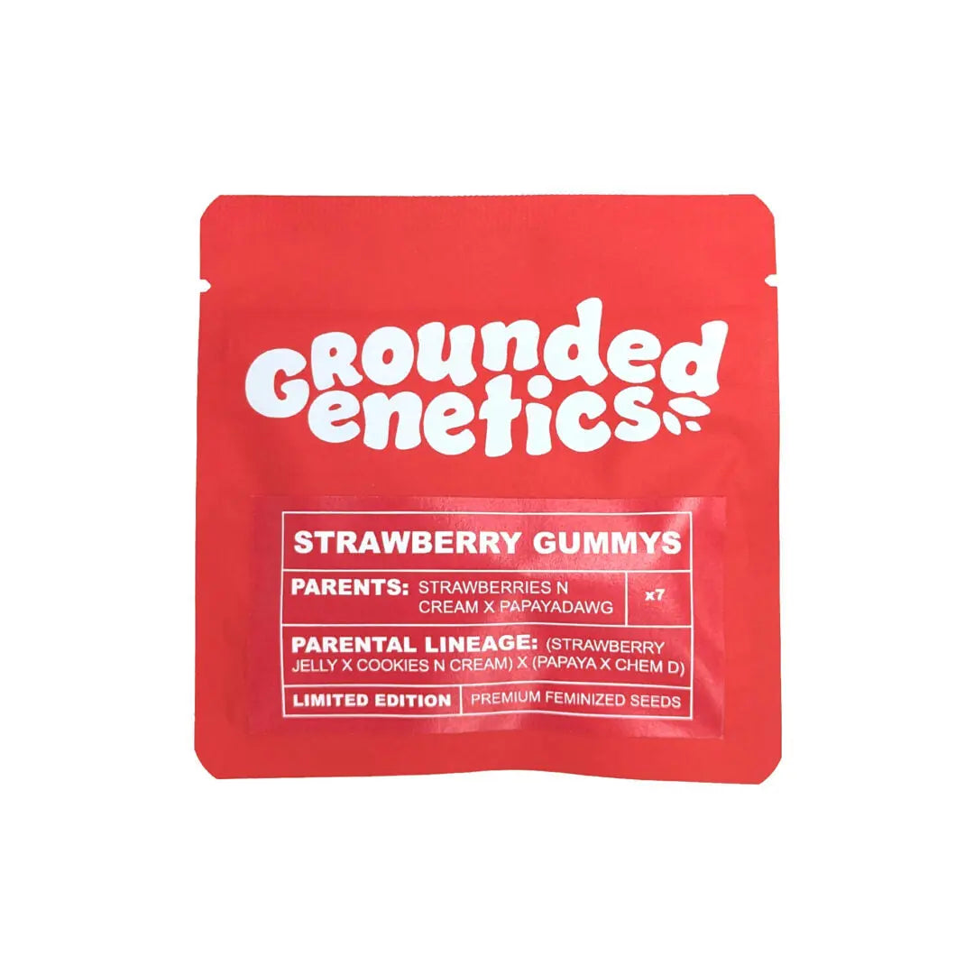 Auf dem Bild ist eine rote Verpackung für Strawberry Gummys von Grounded Genetics zu sehen, hinter der ein CBD-Produkt von 'kleine knospe' steckt.